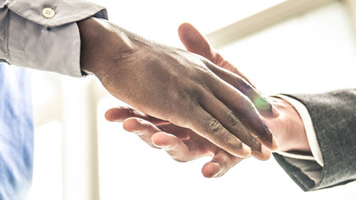 Two hands ready to shake