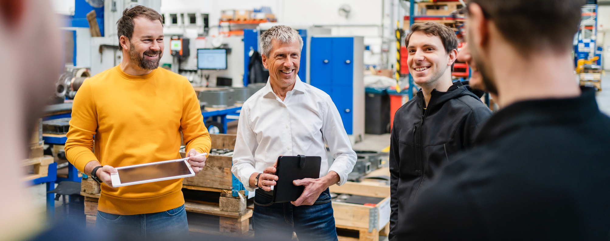 Technology workers in a cutting-edge manufacturing facility