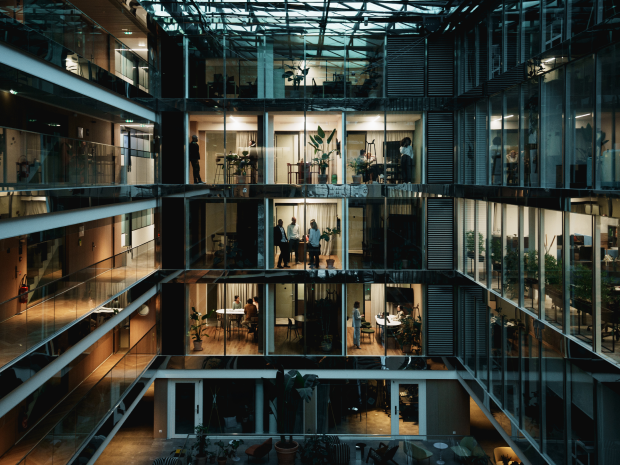 view of conference rooms across atrium of modern office building