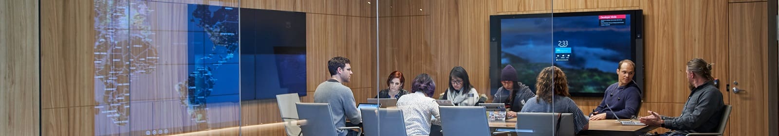 IT professionals gather at a meeting