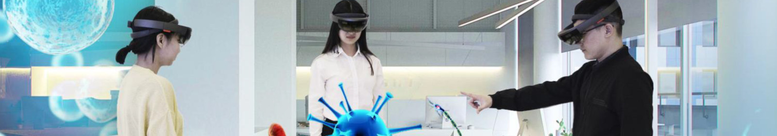 Three students learning with HoloLens