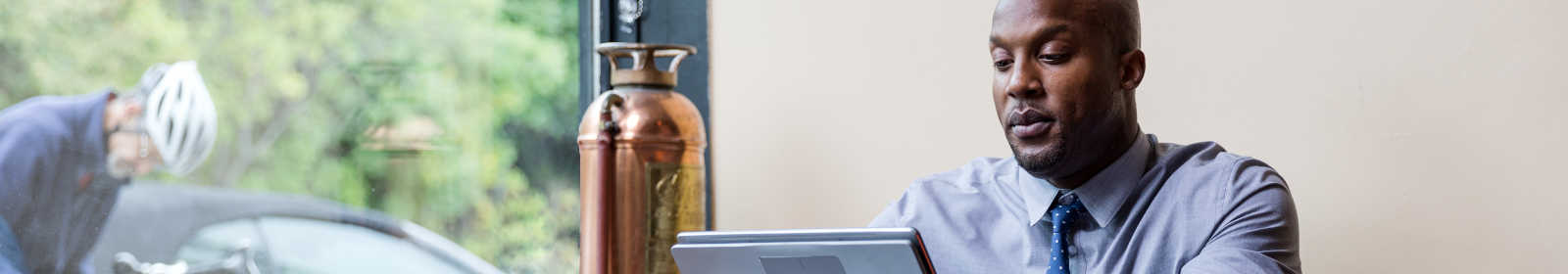 Banker working on laptop