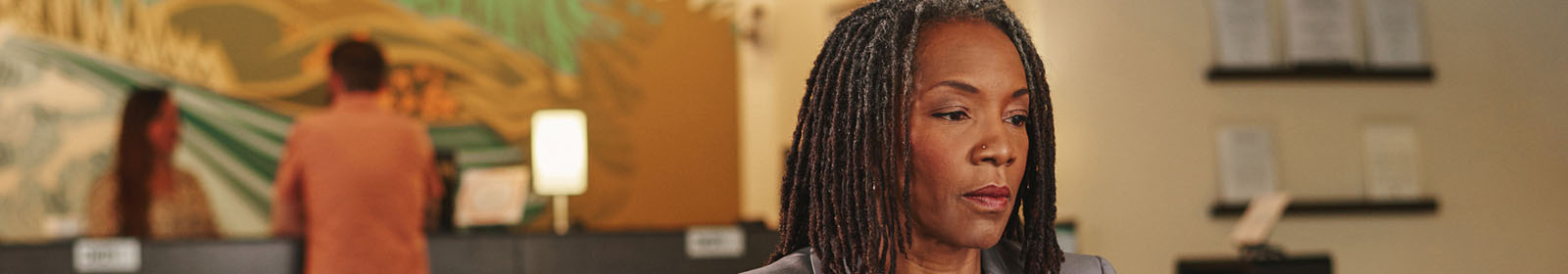 A woman working on a laptop at a financial services company