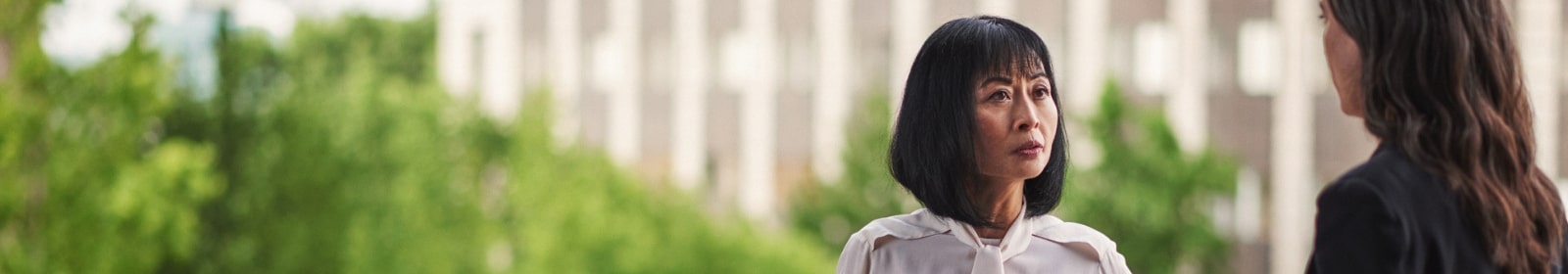 Two public service workers have a discussion at city hall