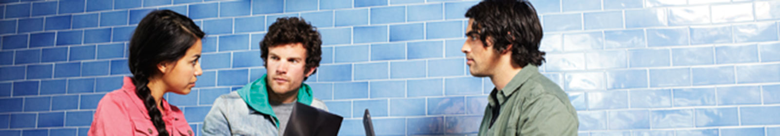 Three people collaborating