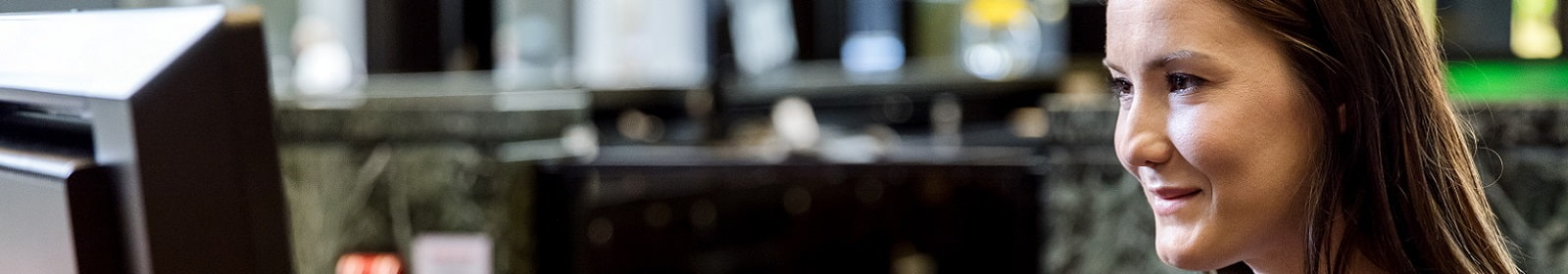 A woman works in a financial services office