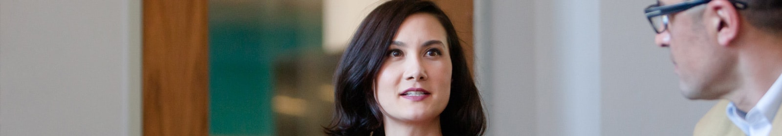 Woman and man mid-conversation