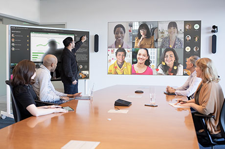 Colleagues in a meeting with virtual attendees using Microsoft Teams