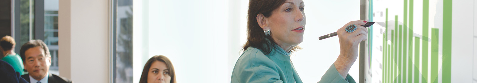 Woman working on smart board during meeting
