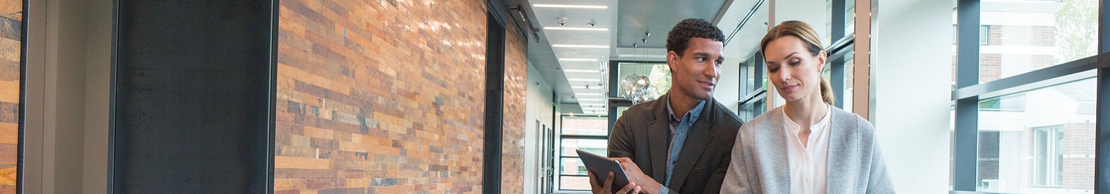 Two employees collaborate