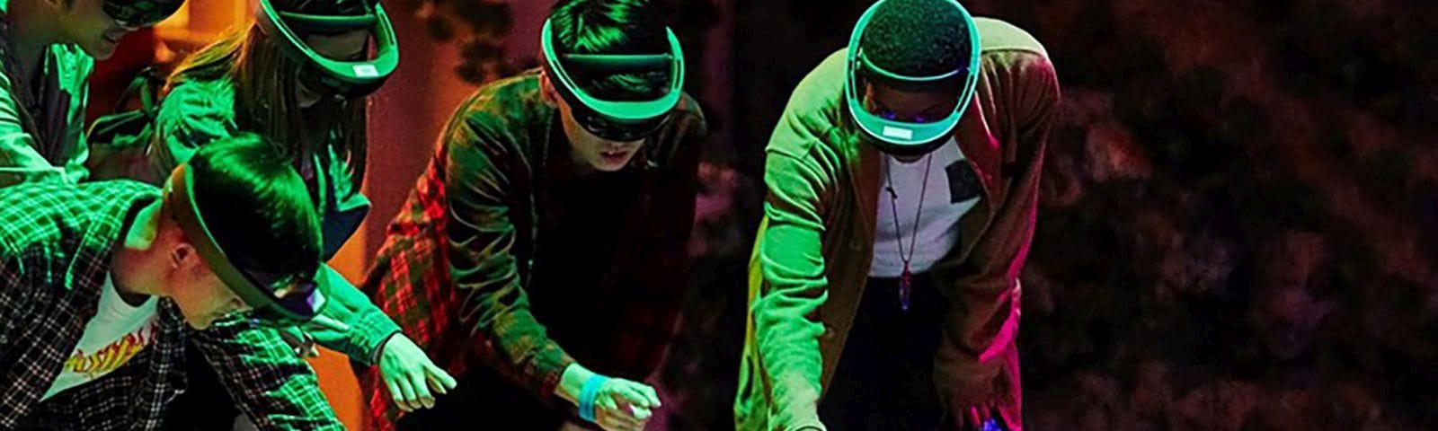 A group experiences an augmented reality exhibit 