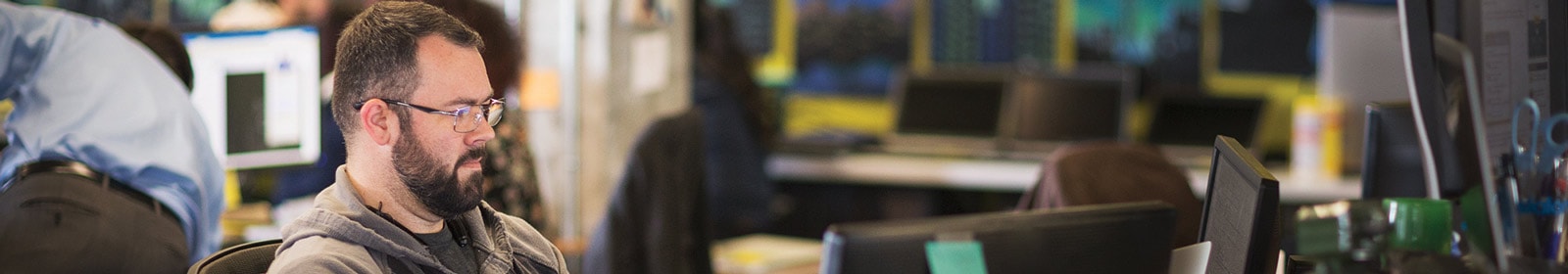 Man working on computer in office