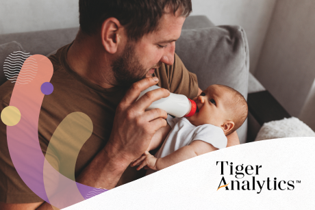 A person feeding a baby with a bottle.