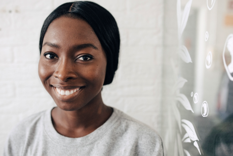 A person smiling at the camera.