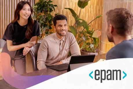 Two people listening to a third person.