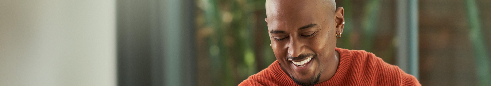 Man watching a video stream while working from home
