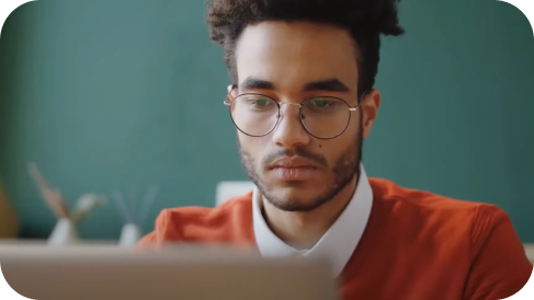 A person looking at a laptop
