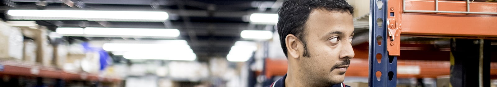 A man works in a warehouse