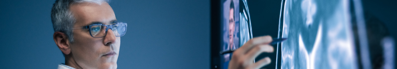 Doctor analyzing brain scans