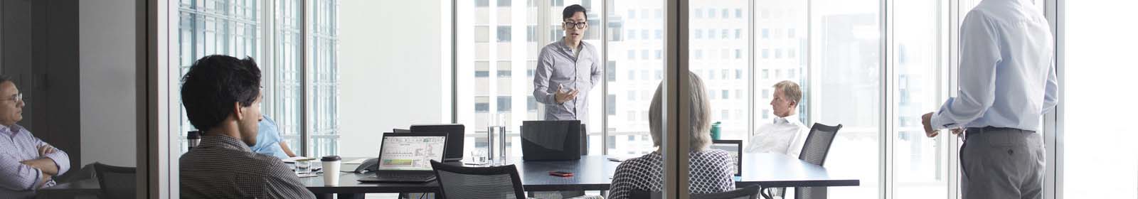 Business conference in front high rise window