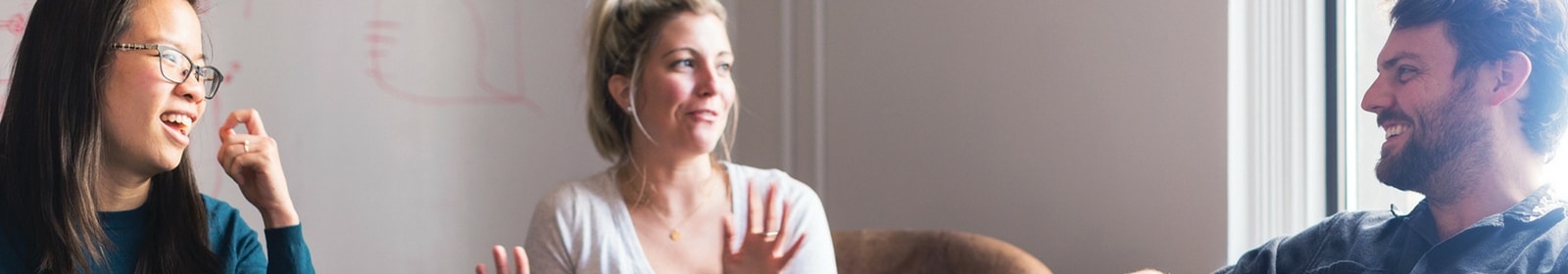 Colleagues meet around a table