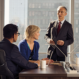 Coworkers discussing during a meeting
