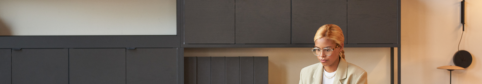 A women works in a fancy conference room