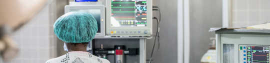 Researcher working in a hospital