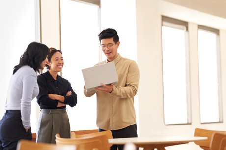 Colleagues collaborating in an office