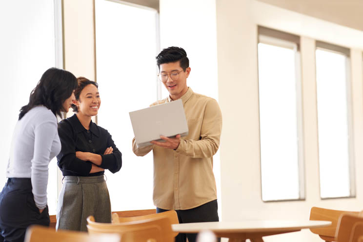 Colleagues collaborating in an office