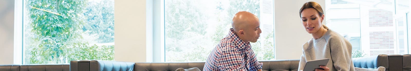 Colleagues discuss a project