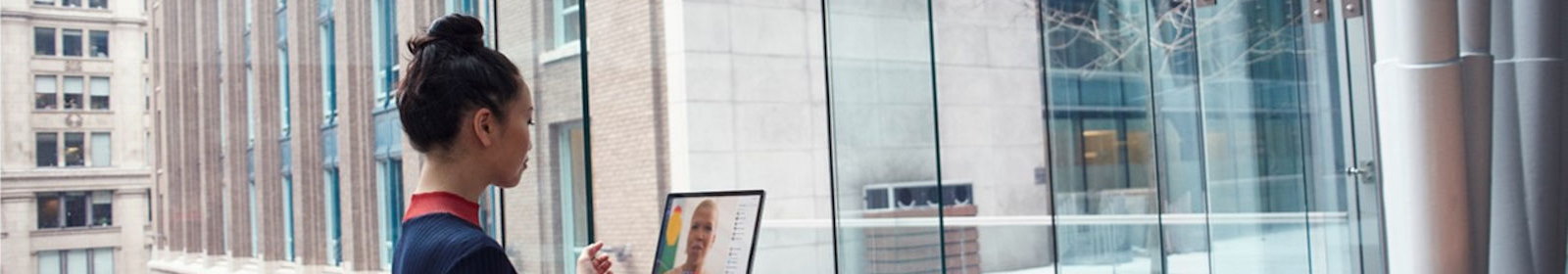 Woman looking at laptop