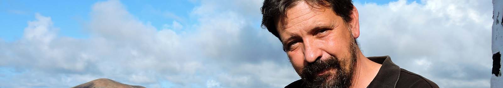 The face of a bearded man