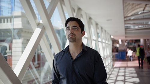 Man gesturing to whiteboard