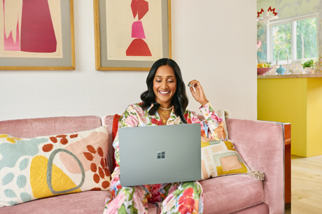 Woman working from home in a cheerfully decorated room