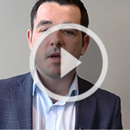 Eamon Moore in hallway discussing CSP