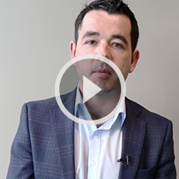 Man named Eamon Moore giving presentation to camera