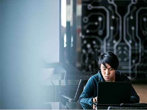 Asian man working in an office