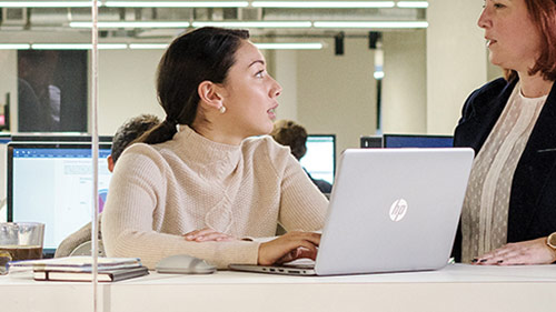 Two women are in conversation