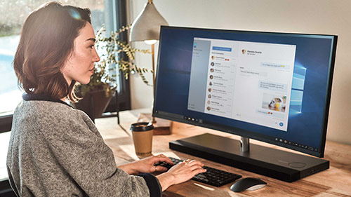 A woman working on the desktop