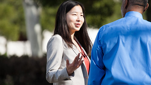 woman discussing with man