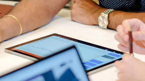 Team working on laptop