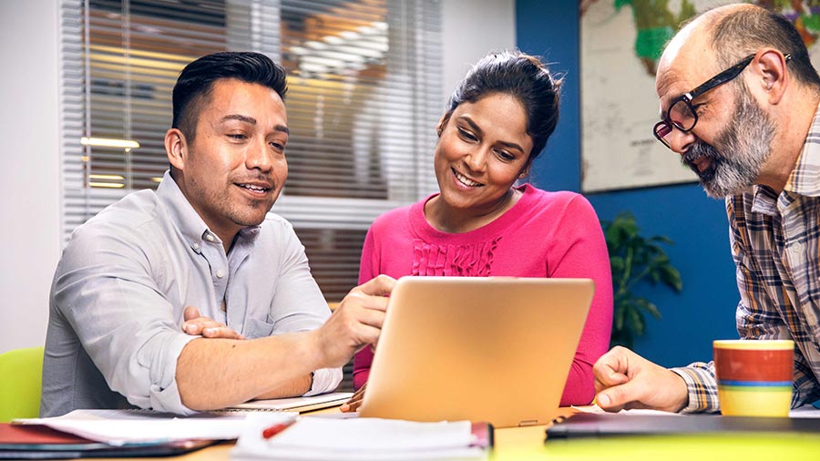 Three person are in conversation