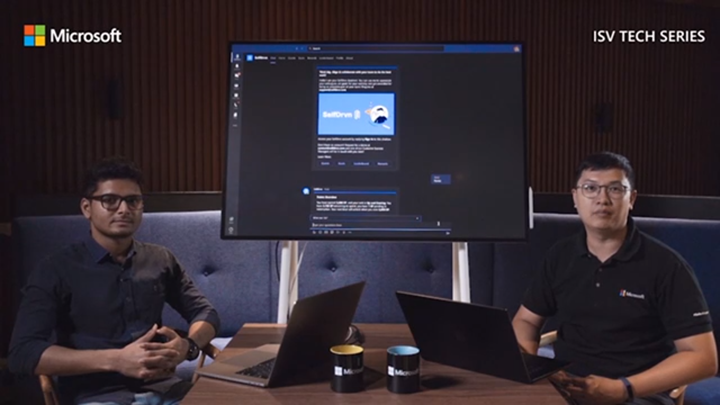 Two people standing to present