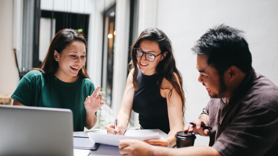 people discussing in meeting room
