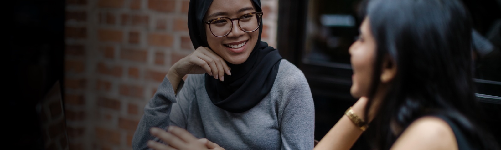 Two women are in conversation