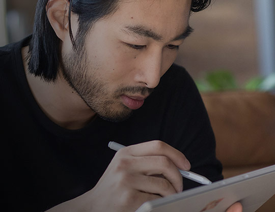 man working on tablet