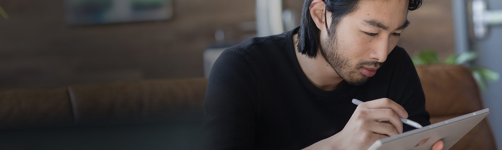 man working on tablet