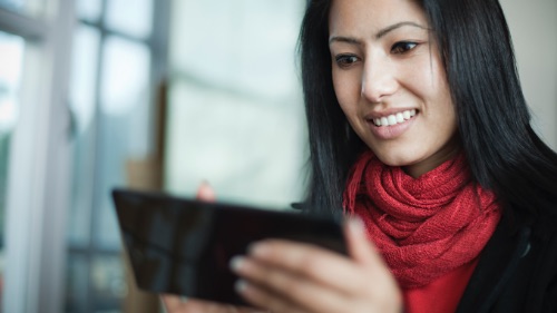 woman working on tablet