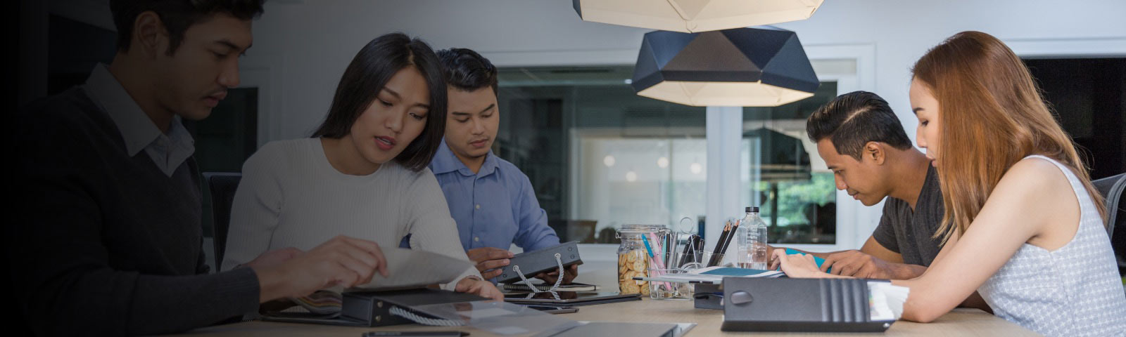 four people are working